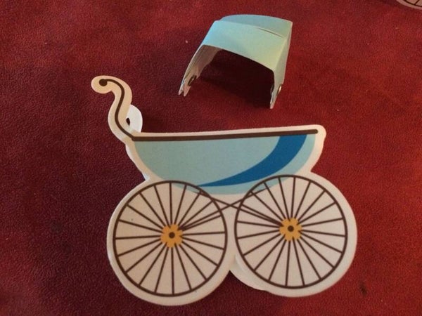 Scatoletta di cartone carrozzina blu