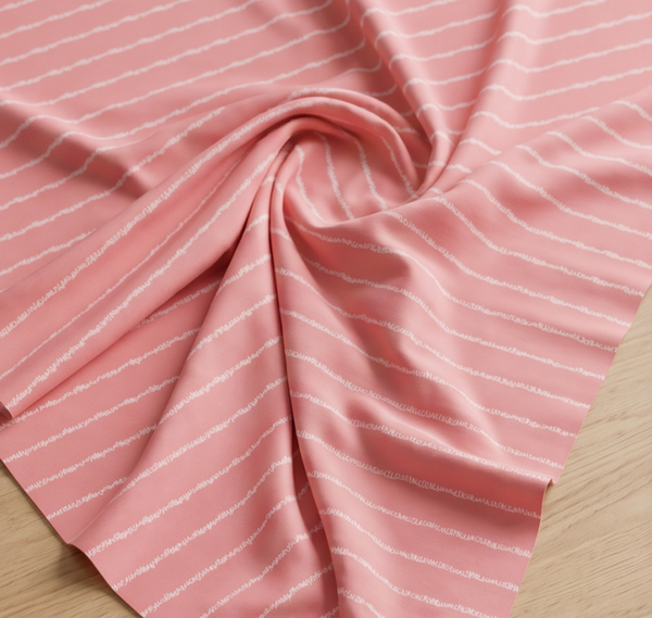 Kritzelstreifen Jersey rosa / weiß