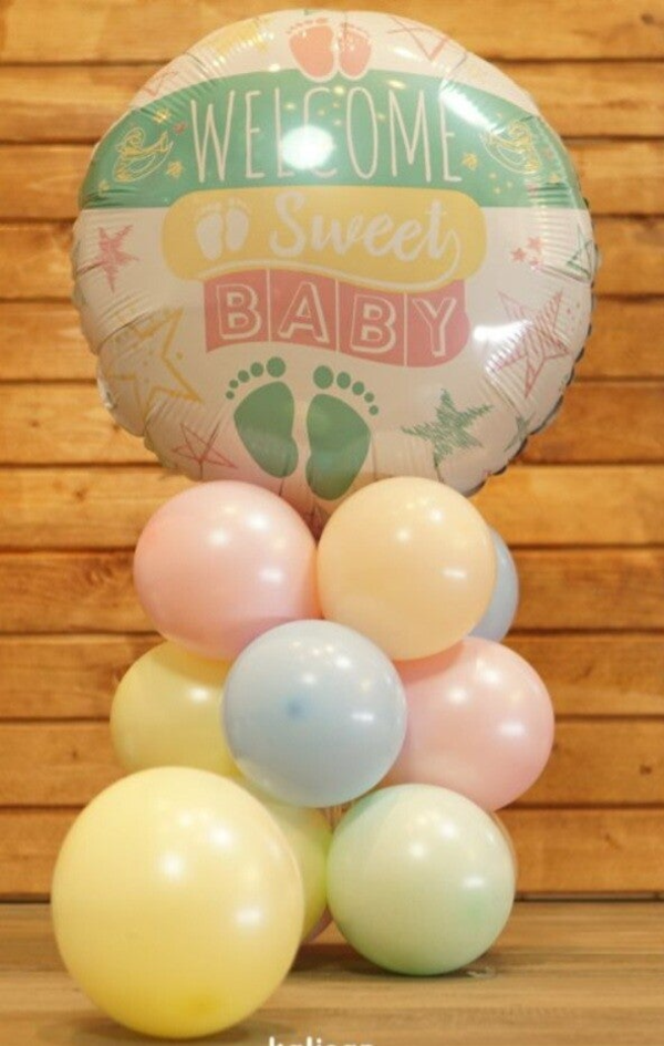 Pastelkleurig tafelstukje "welcome sweet baby"