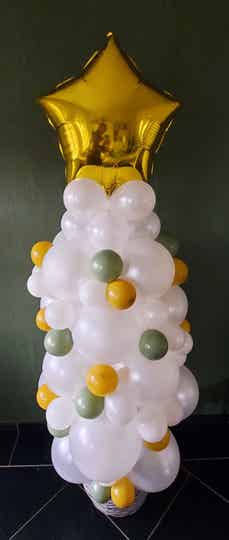 Kerstboom met grote topster.