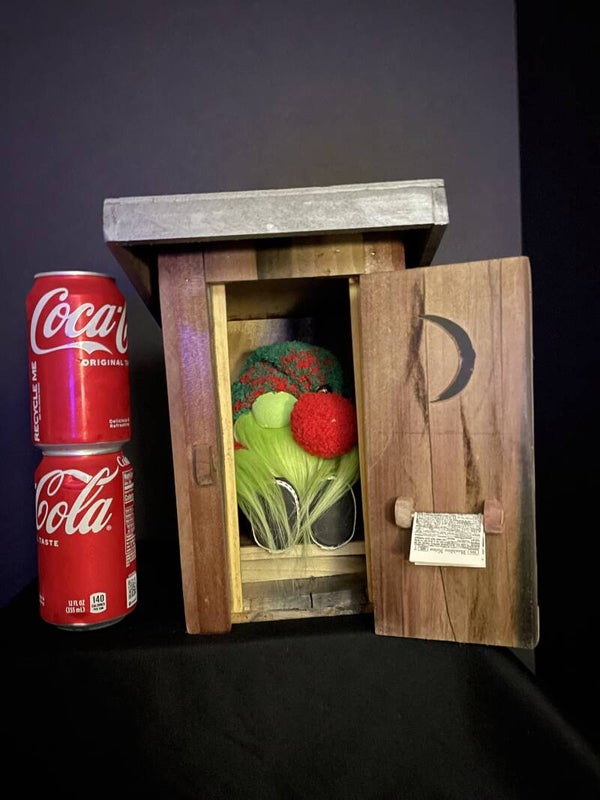 gnome in outhouse grinch