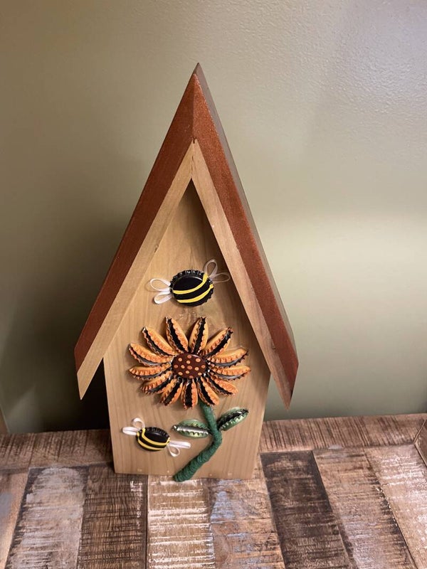 orange bottle cap toilet paper holder