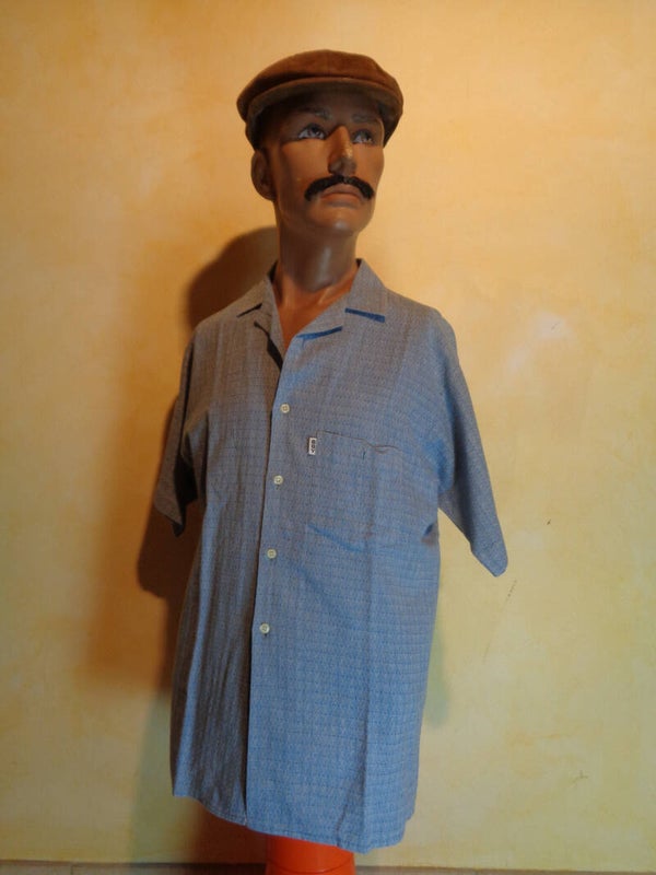 H581 : Chemise bleue 80's T.M