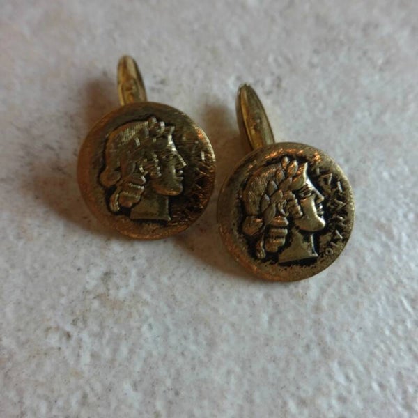 Bi1060 : Boutons de manchette grecs