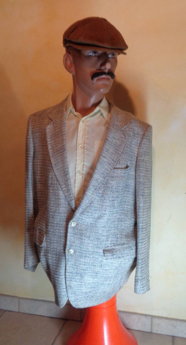 H1654 : Veste grise 80's T.M