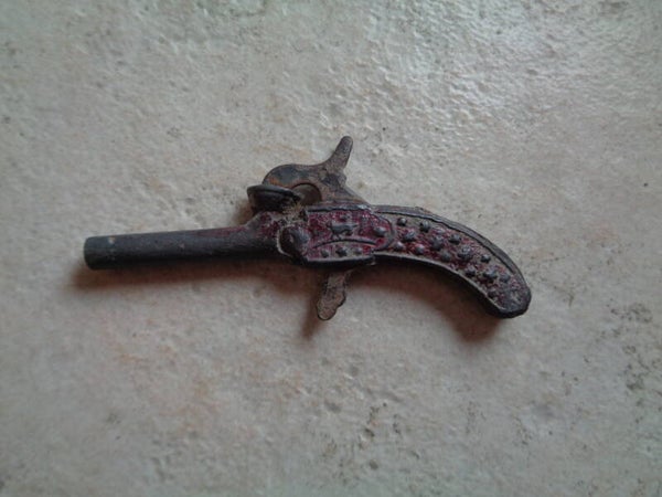 Cu2329 : Jouet revolver 40's