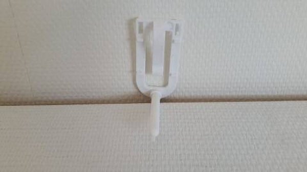 Sepiahouder met zitstok