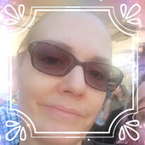 Woman with sunglasses smiling