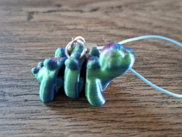 Telefoonhanger : 3D : Paarsgroene Stegosaurus !!