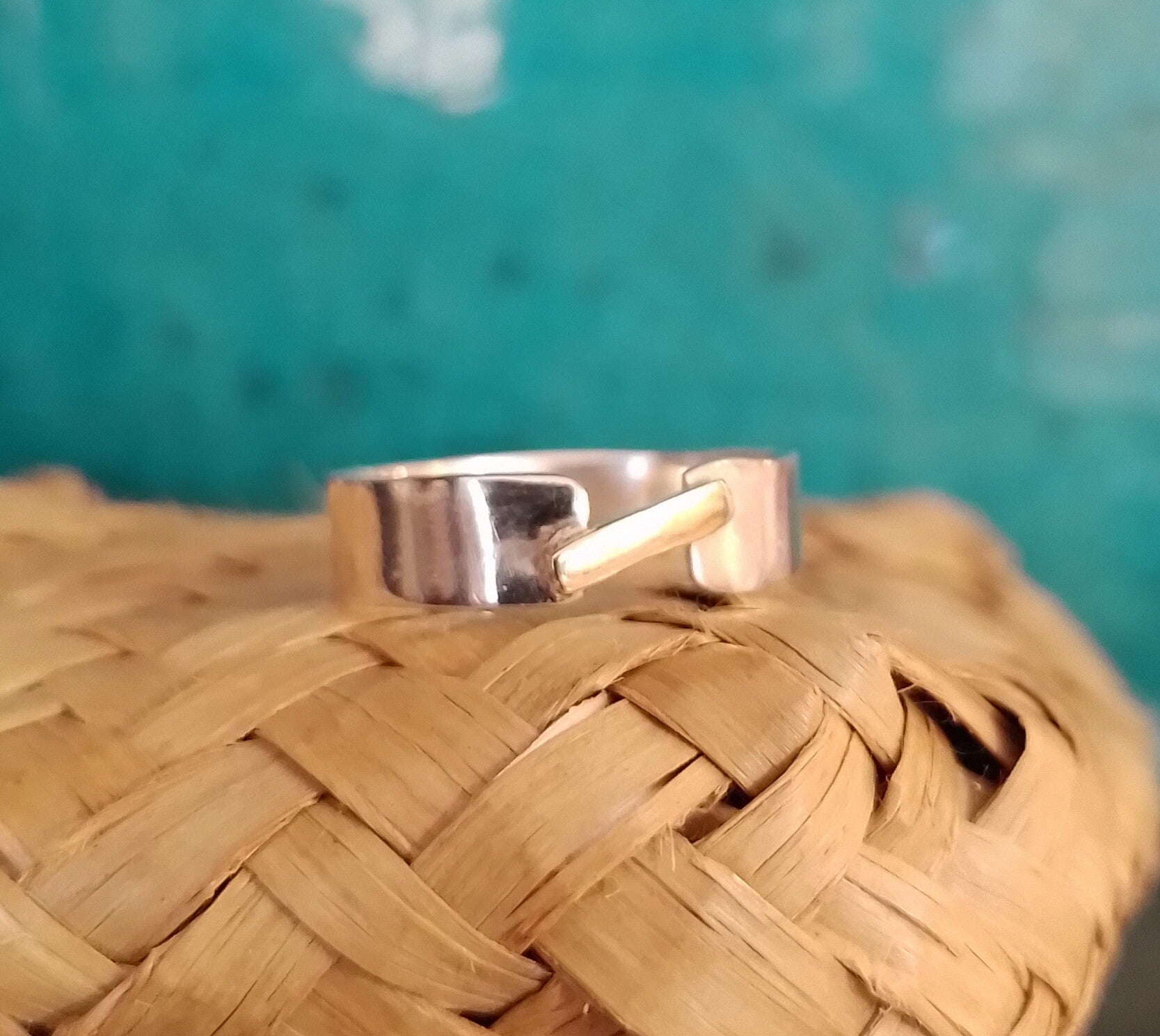 Sterling silver ring with 14 kt gold thread