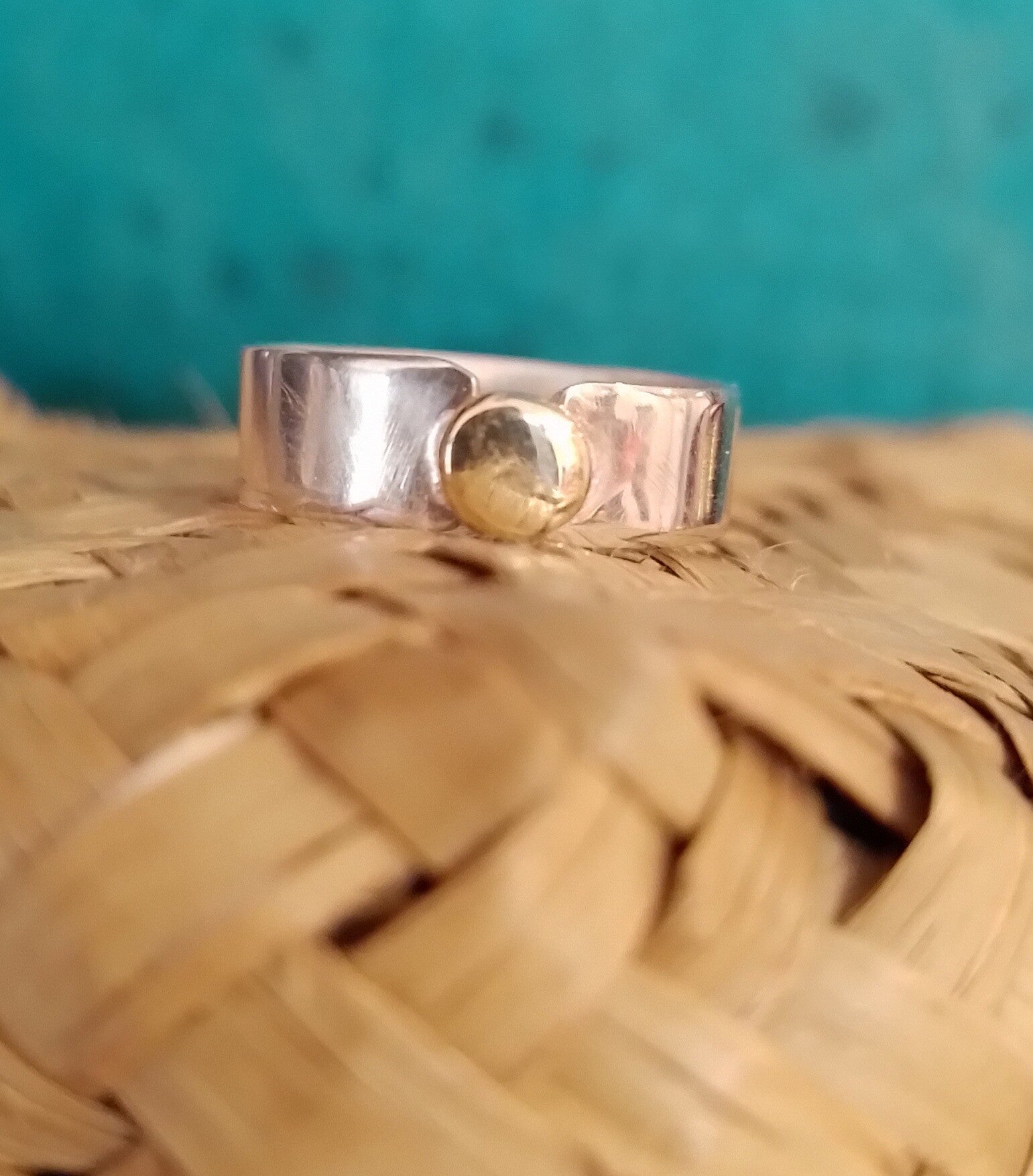 Small silver ring with 14 kt gold disc