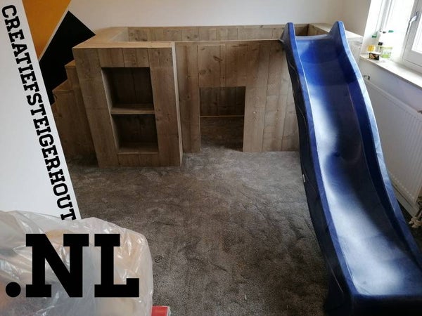 Hutjesbed met glijbaan