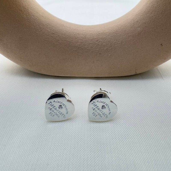 Orecchini Linea Cuore Punto Luce