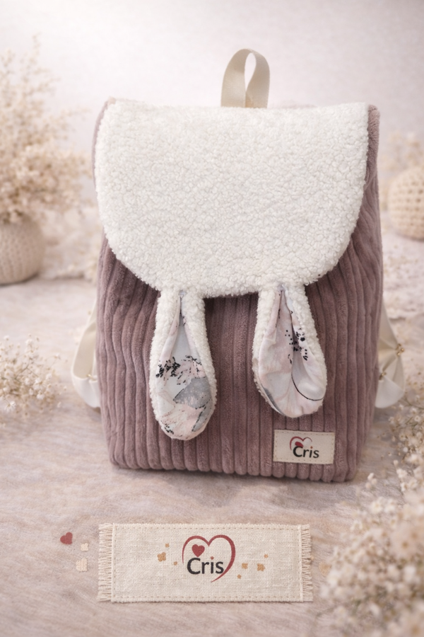 🐰 Sac Mauve Bunny Flap sherpa blanc & oreilles pastel 🌸 Velours doux et accessoires assortis ✨ Douceur et charme pour accompagner bébé partout 💛