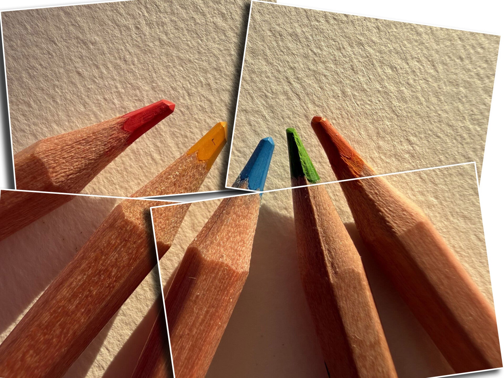 Spiten von Farbstiften in Nahaufnahme. Von Links nach rechts: Rot, Gelb, Blau, Grün, Orange.