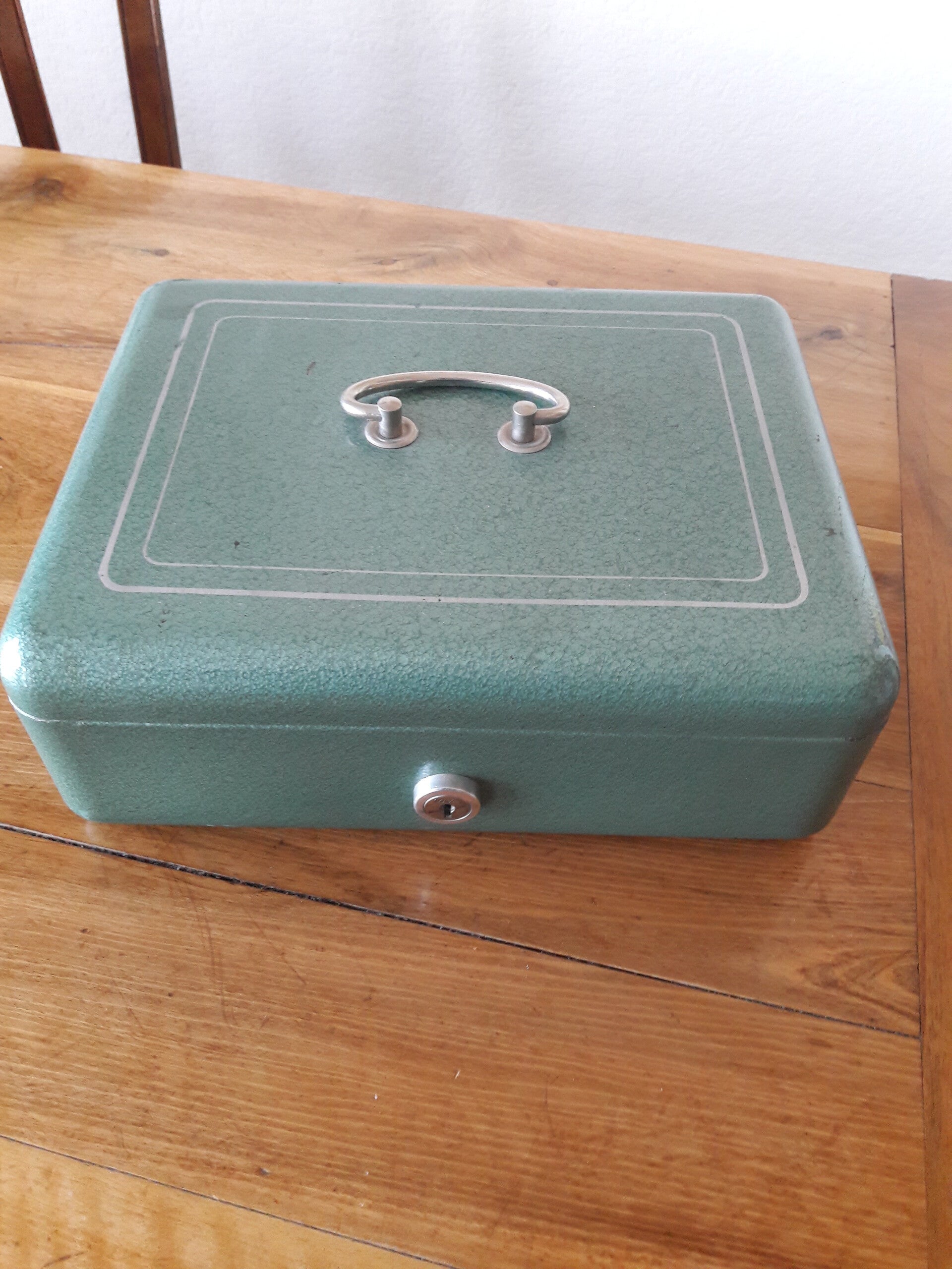 Caissette à monnaie avec sa clé