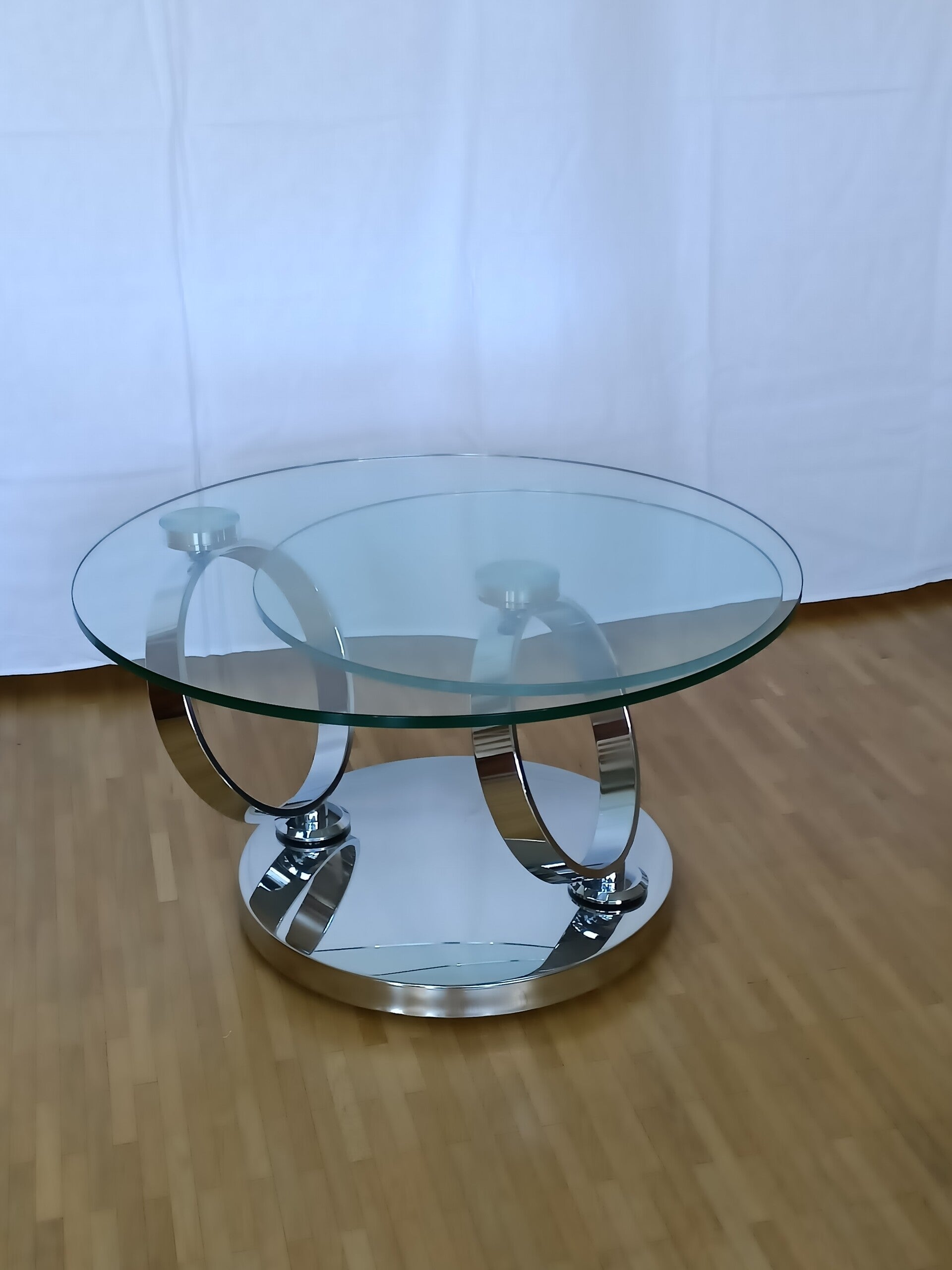 Table basse plateaux pivotants verre et acier chromé
