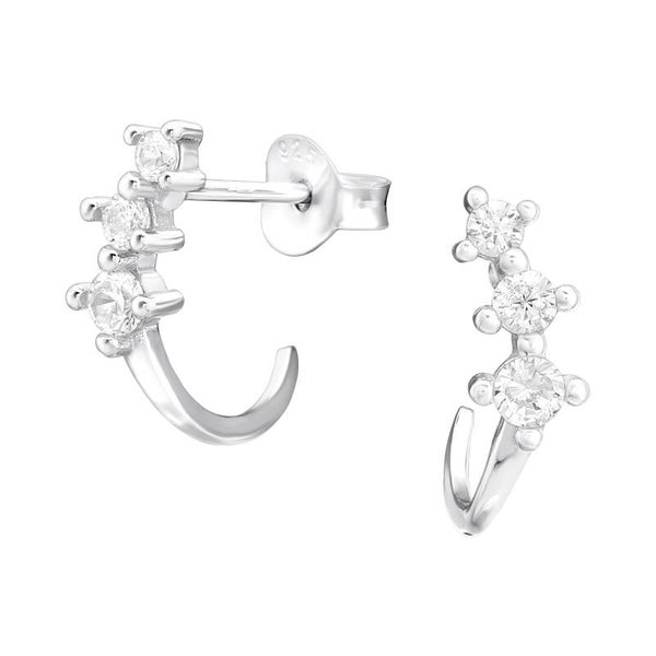 Silver curved ear studs with stones