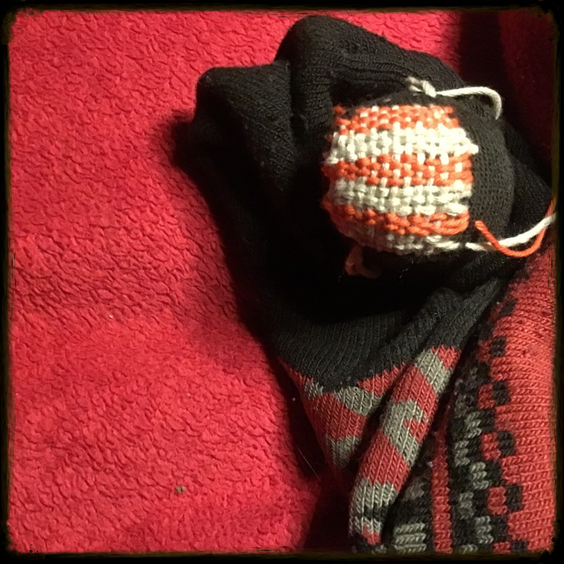 Visible mending socks. Creative sock mending.