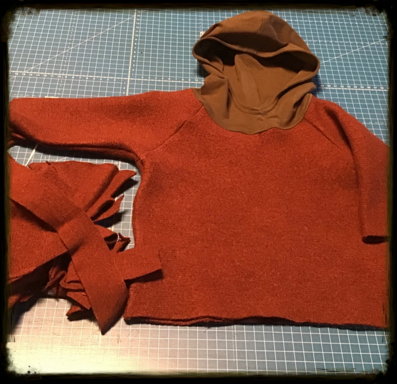 Upcycled baby hoodie from merino wool sweater