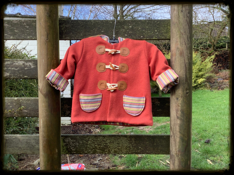 Houtje Touwtje baby jasje