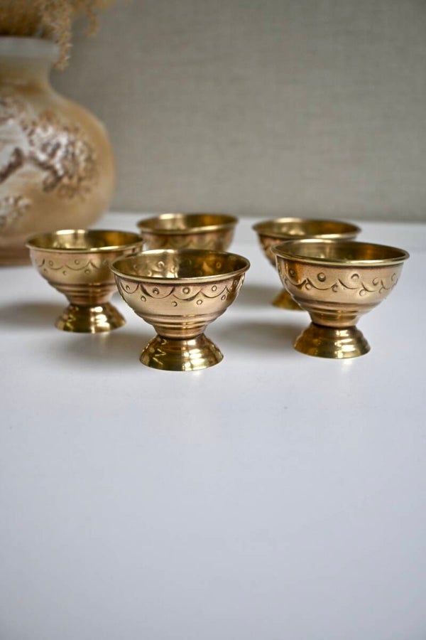 Mooie set messing eierdopjes