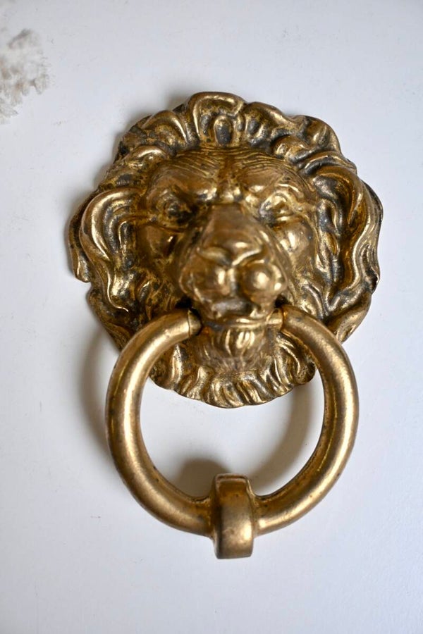 Deurknop leeuw van koper