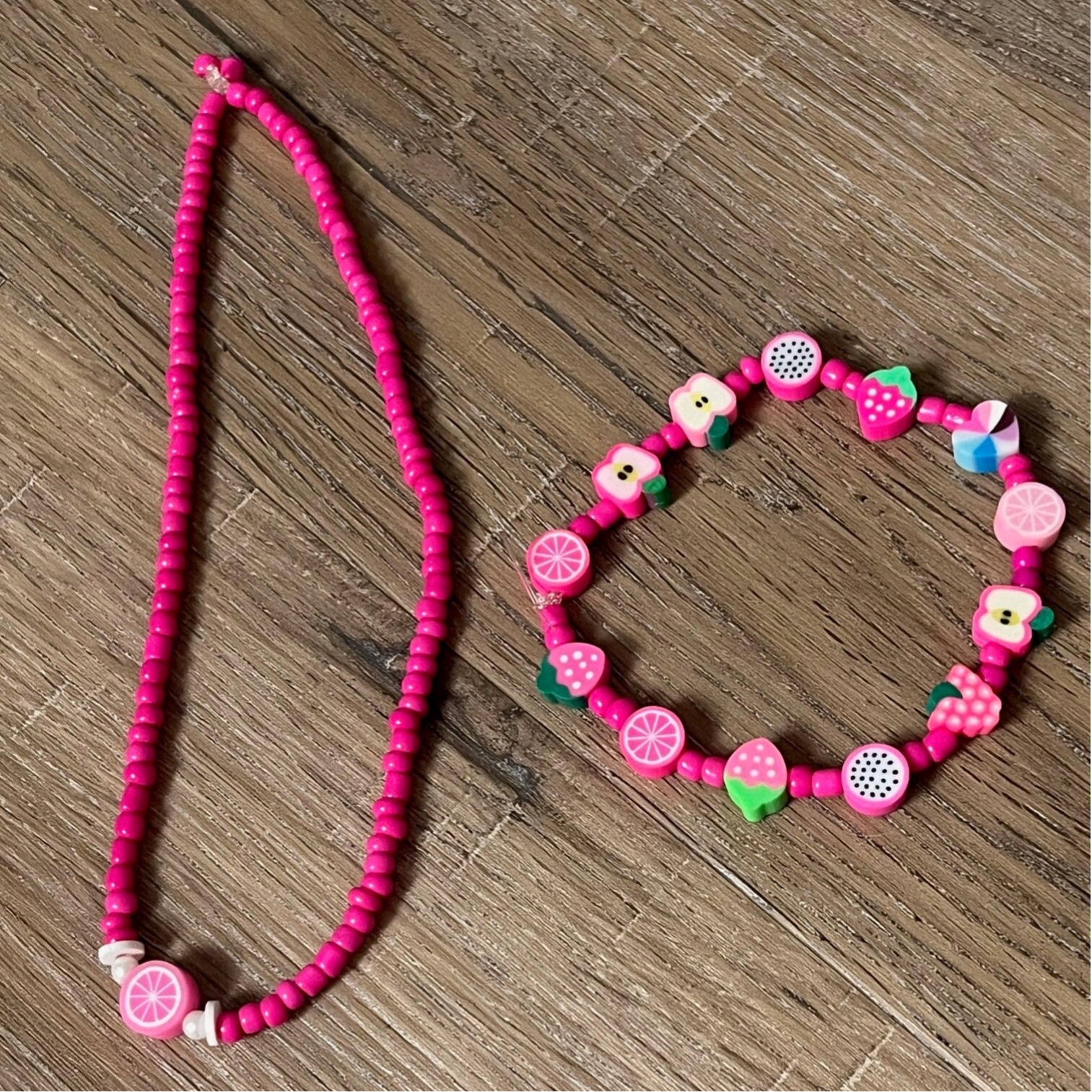 Roze fruit set armbandjes