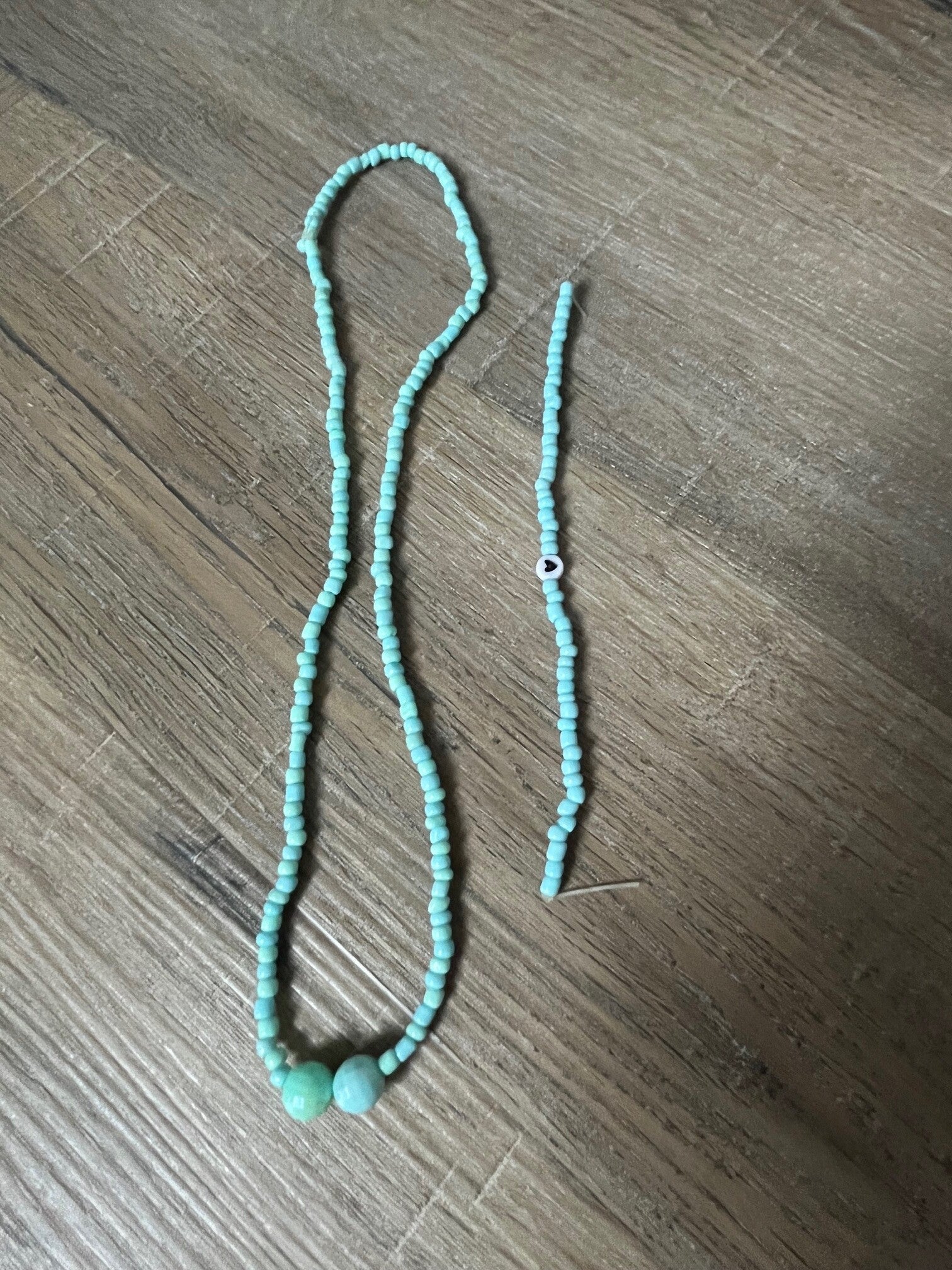Blauw ketting met sleutelhanger
