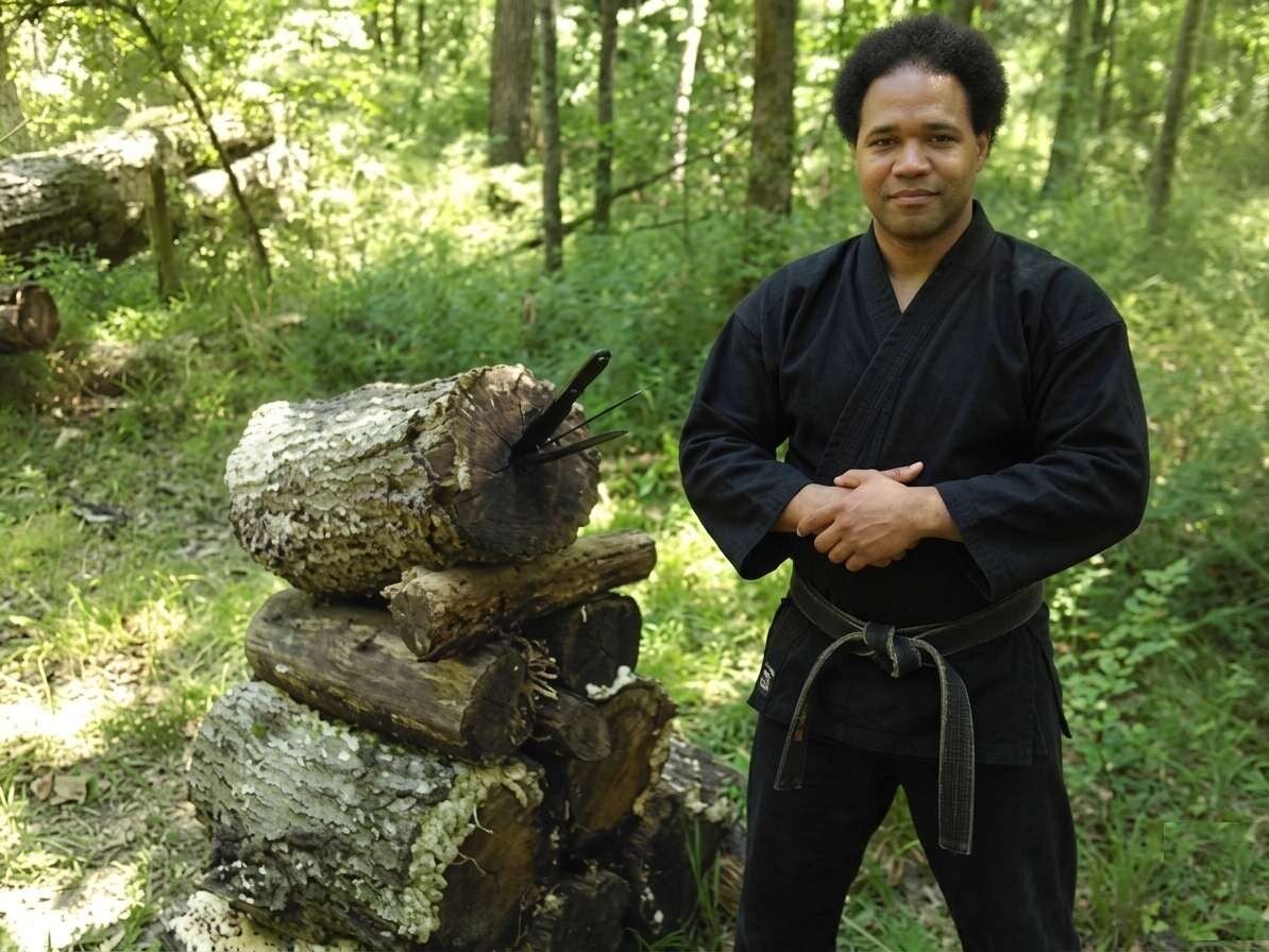 student Brandon Williams demonstrates incredible focus and accuracy during a knife-throwing session at the Black Scorpion Ninjutsu Society camp