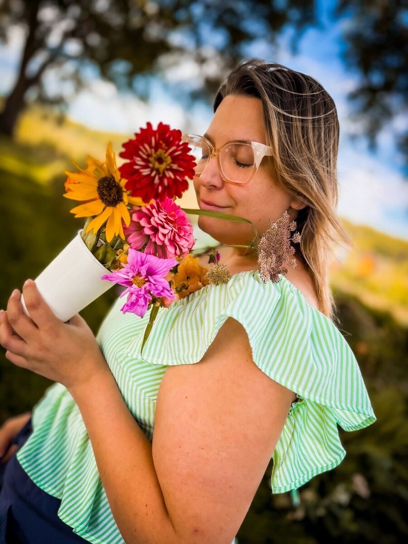 Rachel holding a fresh-picked bouquet