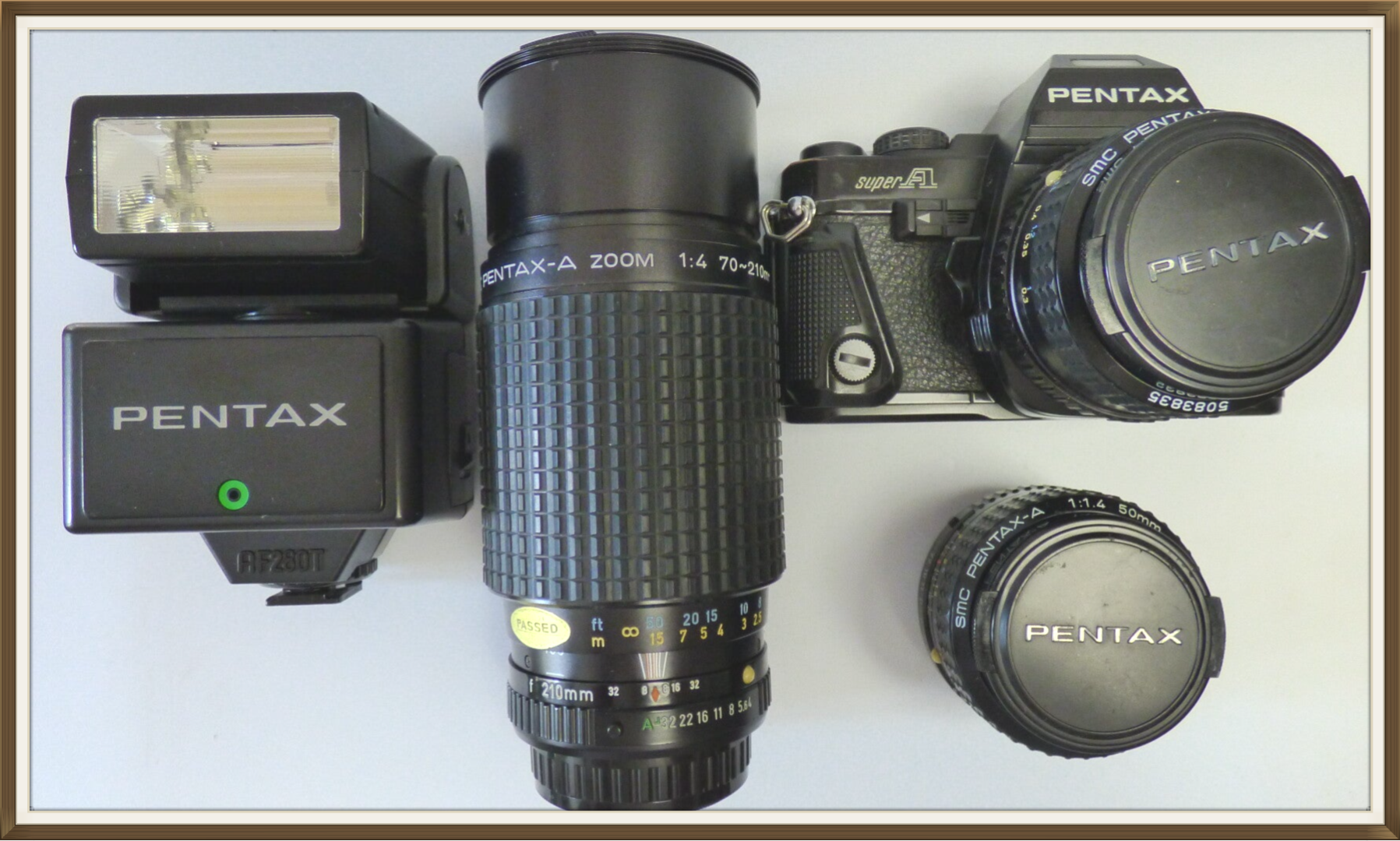 PENTAX A + SMC PENTAX-A 2.8/28mm+SMC PENTAX-A 1.4/50mm + ZOOM SMC PENTAX-A  4/70-210mm + FLASH AF280T PENTAX