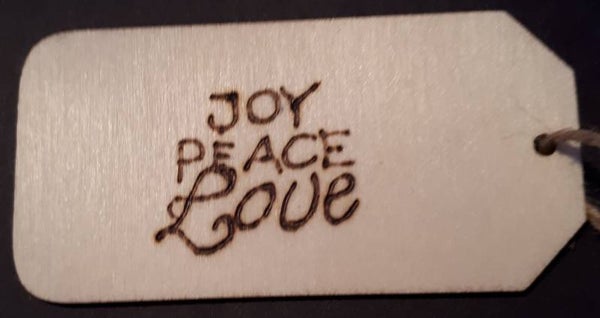 Kadolabel joy peace love