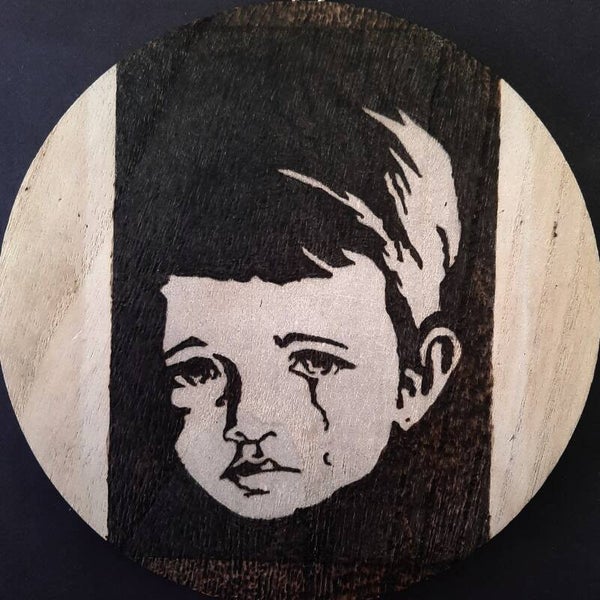 Wandbord Huilende jongen