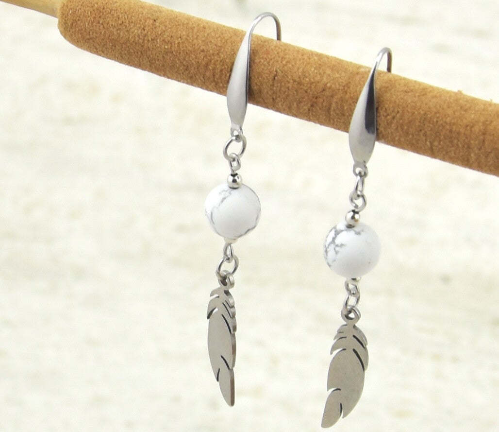 Oorbellen Howliet met veer