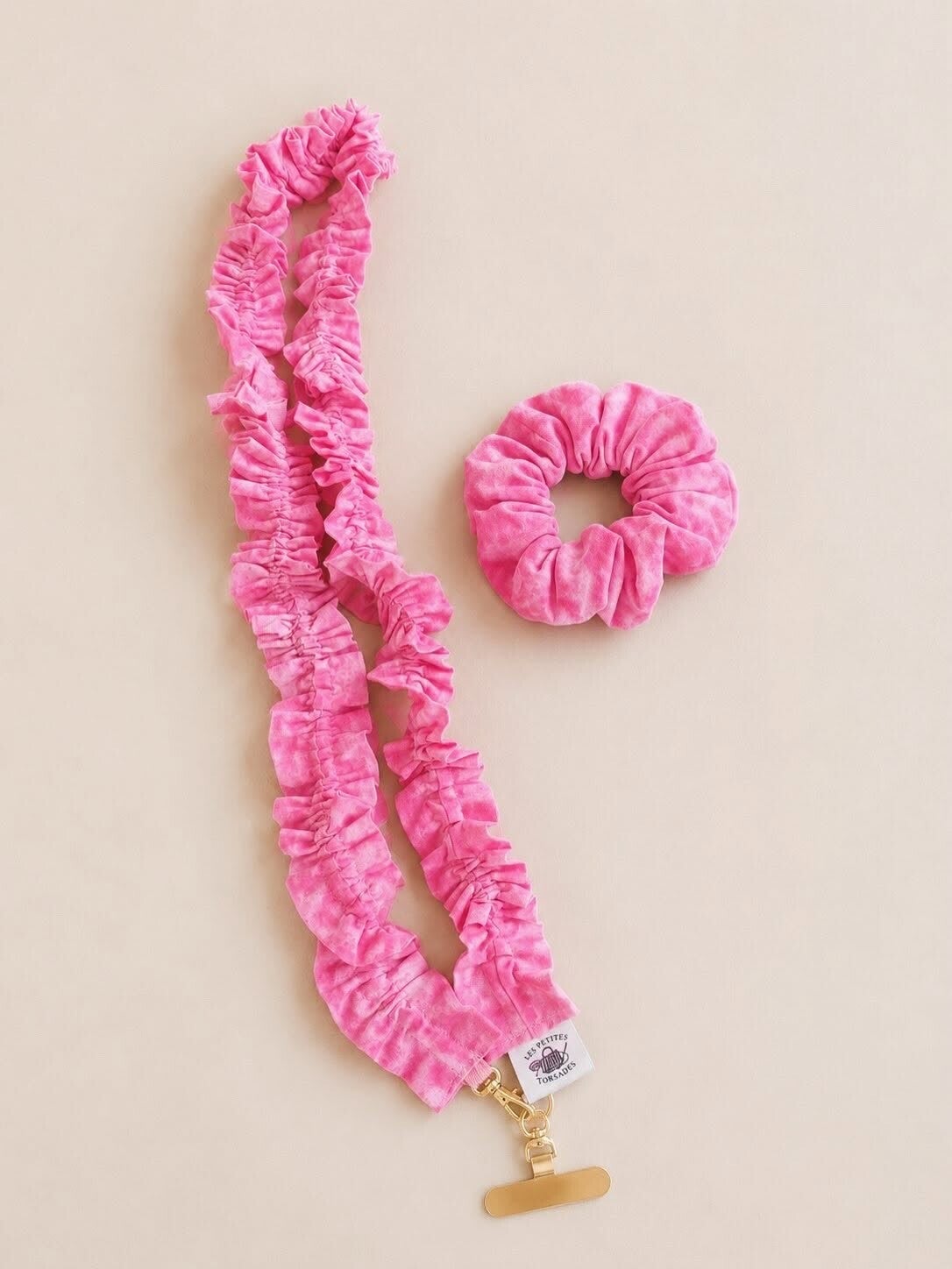 Cordon de téléphone et chouchou dégradé rose