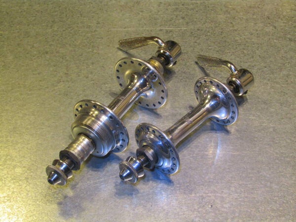 CAMPAGNOLO GRAN SPORT Vintage 70's 6 speed hub set 126mm ITALIAN Thread with FLAT QR LEVERS TAKE-OFFS from a never used wheel set so it will show signs of being fitted. in very good condition, BX33A 6977 RK13