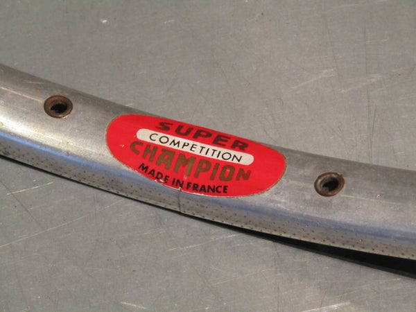 SUPER CHAMPION Vintage 70's COMPETITION 28o 700 TUBULAR Rim 2nd hand Will show signs of gluing Sticker will be in near MINT Condition This rim will be from a depleted track wheel so it will show no signs of Brake pad wear 0000 05/03/23
