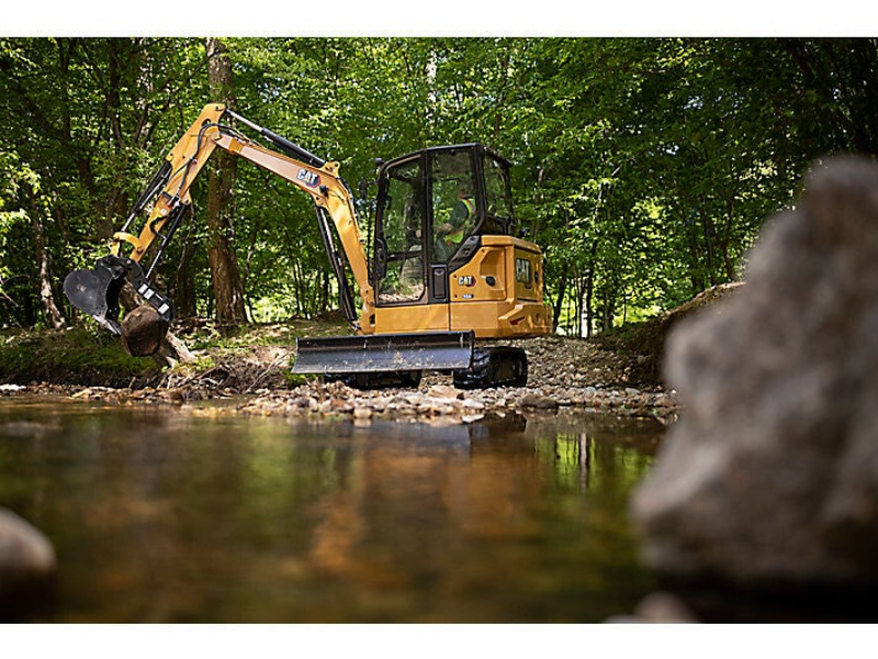 Mini Digger and driver hire Tiverton. Ponds and Waterways.