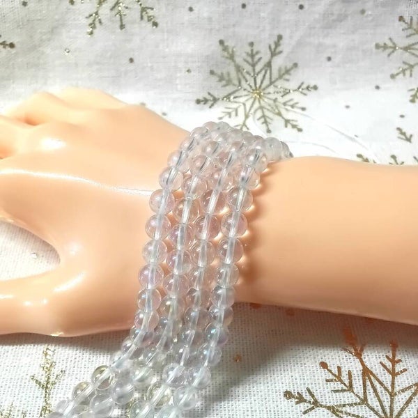 Aqua Aura Blanc perles sur fil