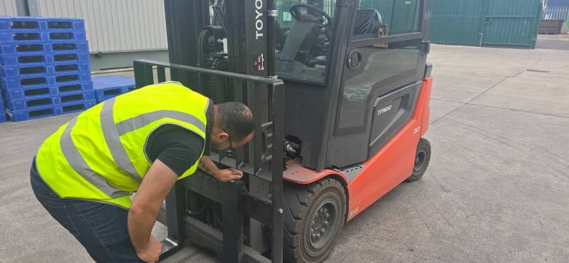 GH Training forklift operator completing a pre-use inspection