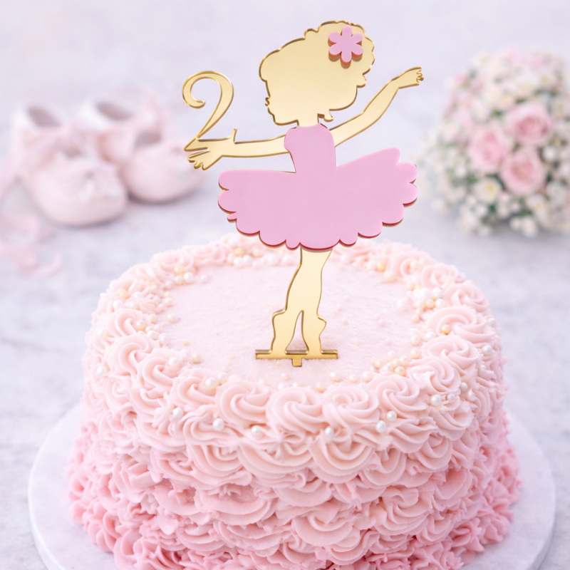 Personalised ballerina cake topper with name and age on pink birthday cake UK