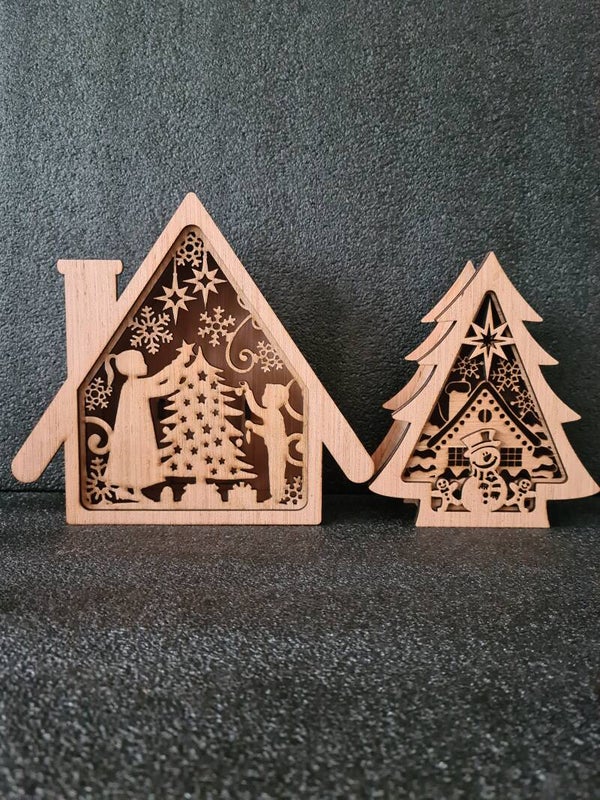 Kersthuisje warme kerstsfeer + kerstboom winterdorp