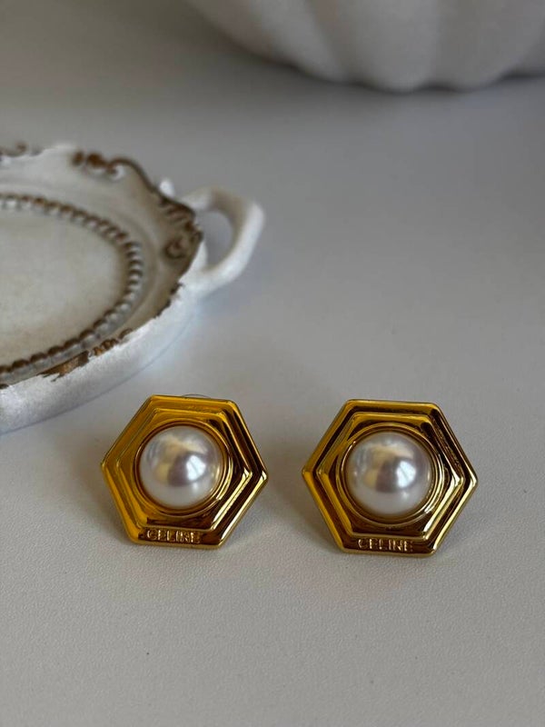 Orecchini vintage con perla incastonata celi
