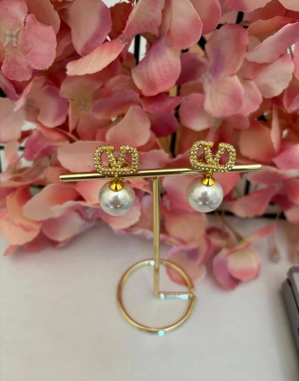 Orecchini vale pendenti perle