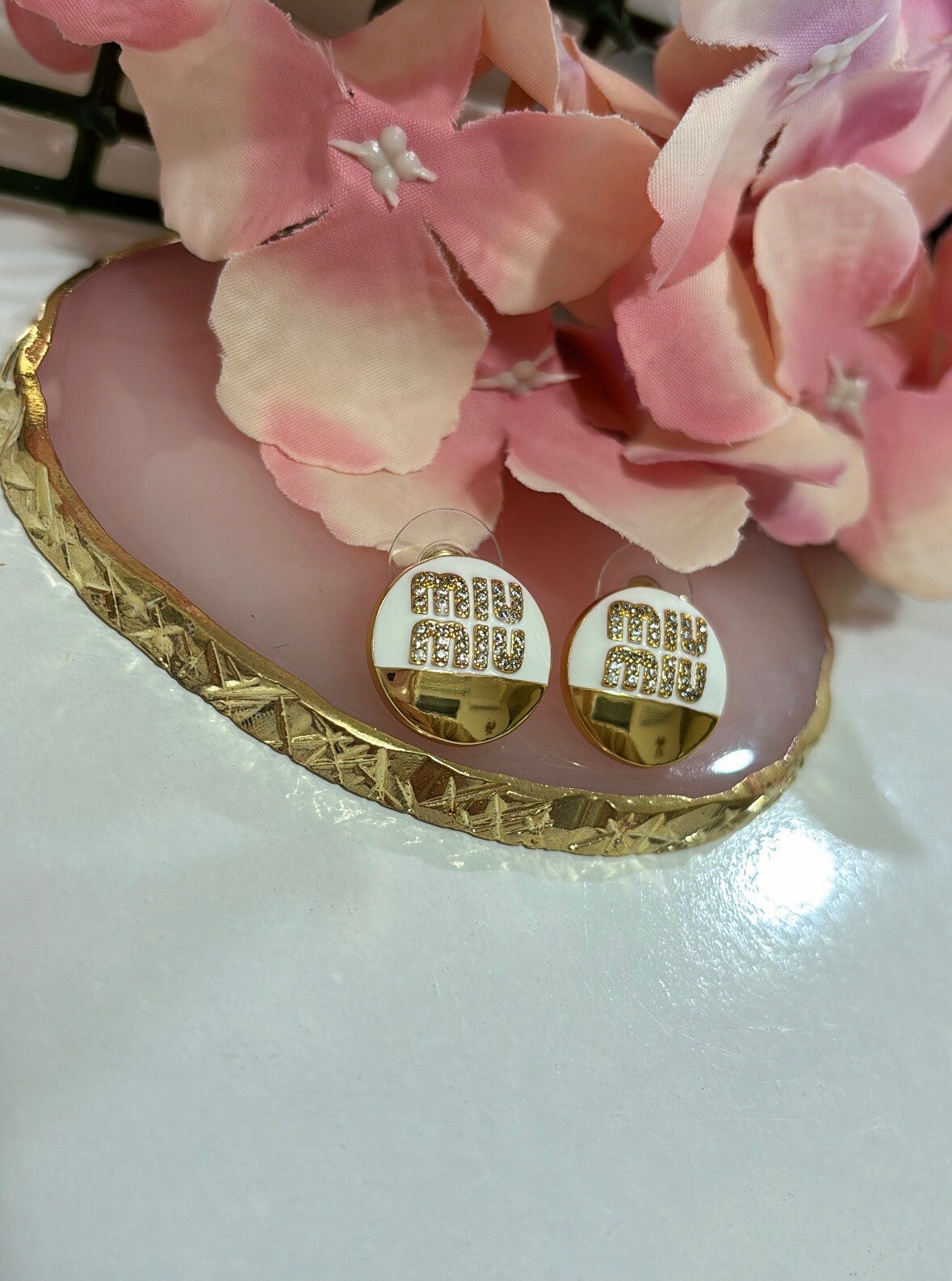 Orecchini bianchi miu