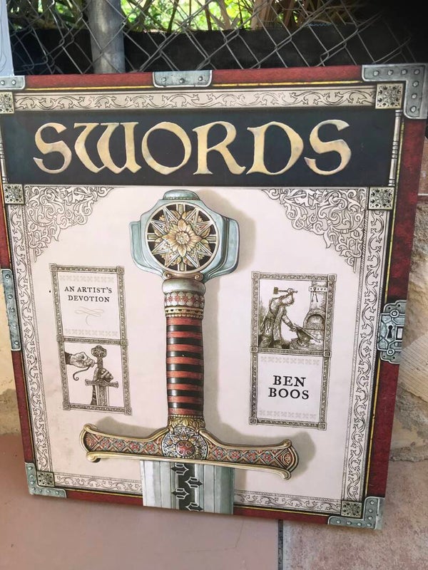 Book over swords