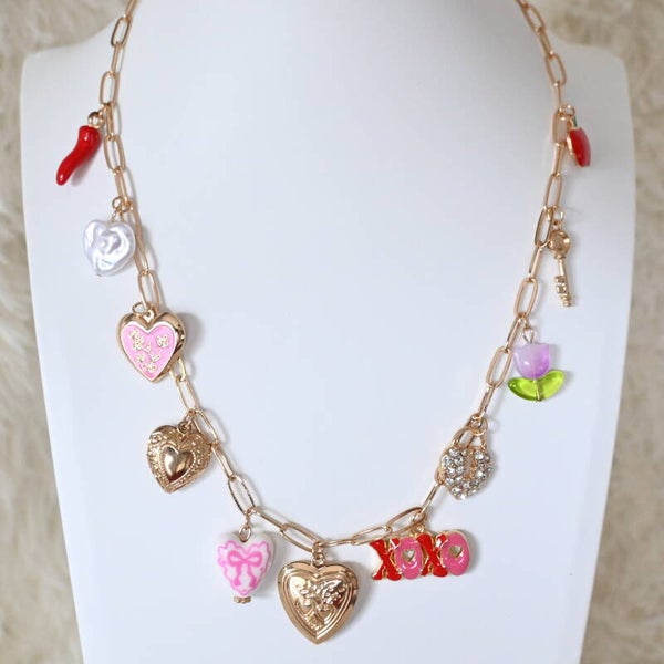 Goudkleurige Ketting met Speelse Bedels – Nieuwe Collectie