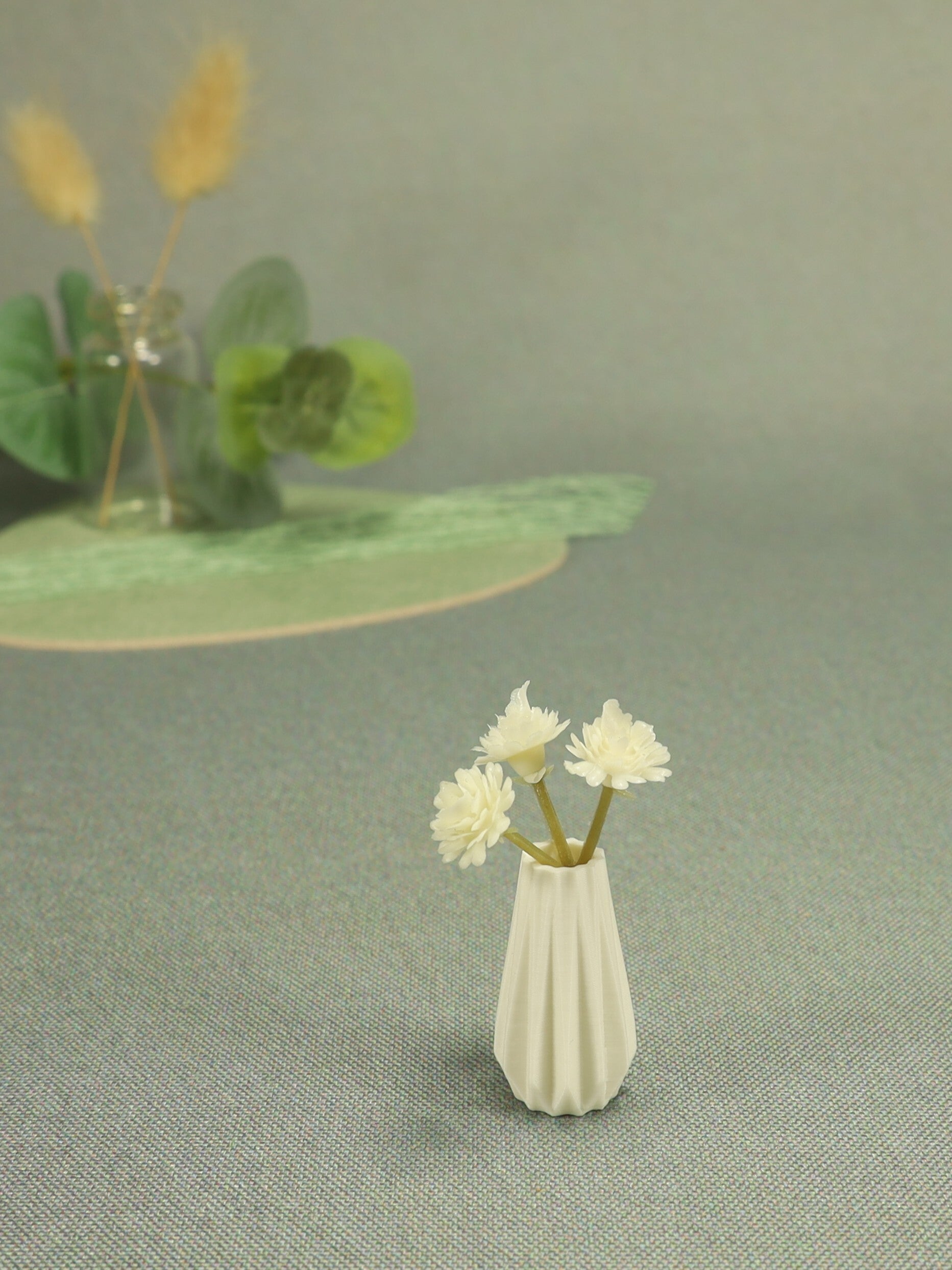 O | Mini vaasje met bloemen