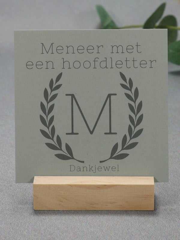 K | Meneer met een hoofdletter M